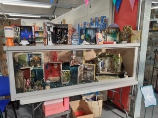 A recent exhibition of Book Boxes in Wyevale made by ages 9 to 80 years.  Kate’s is in the middle on the bottom shelf.